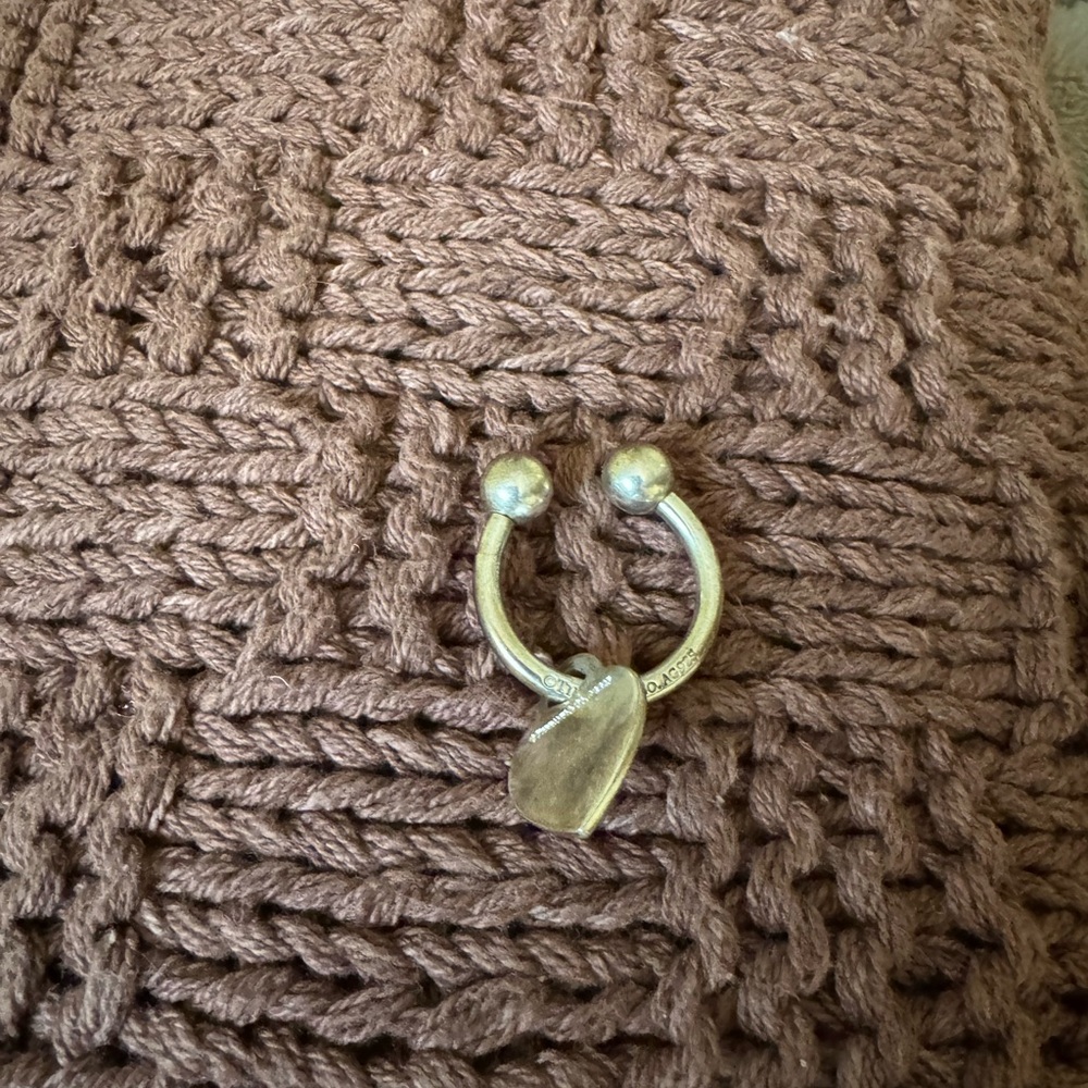 Silver Heart Ring on Brown Knit